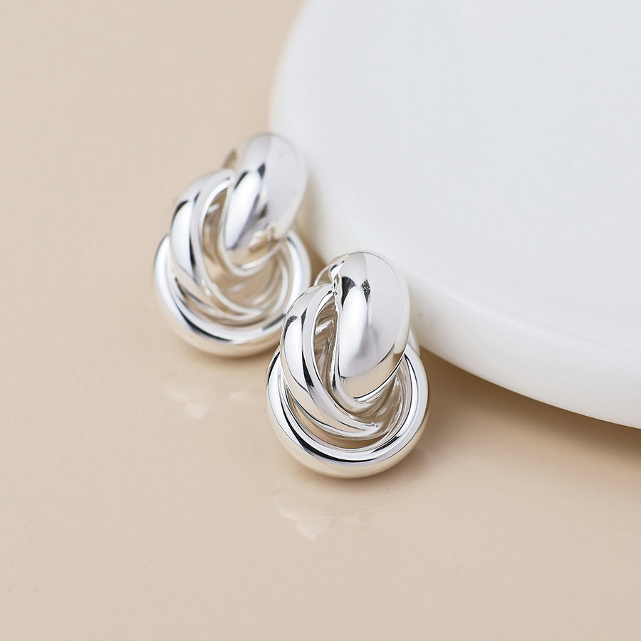 POM Silver plated polished knot earrings