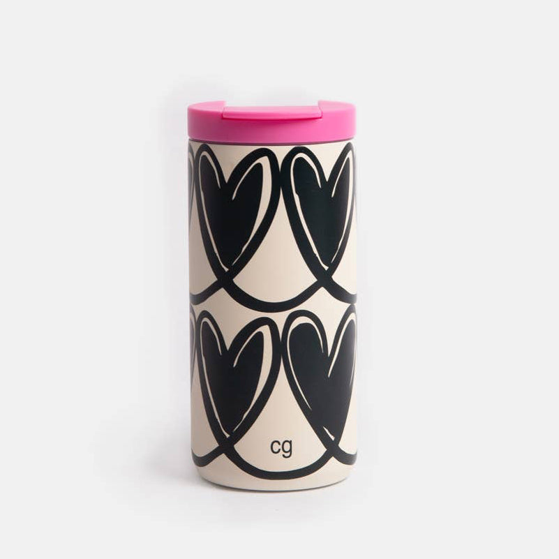 Coffee cup with black heart pattern and pink lid on a white background