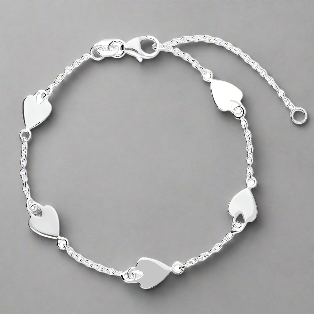 Sterling Silver Spaced Hearts Bracelet