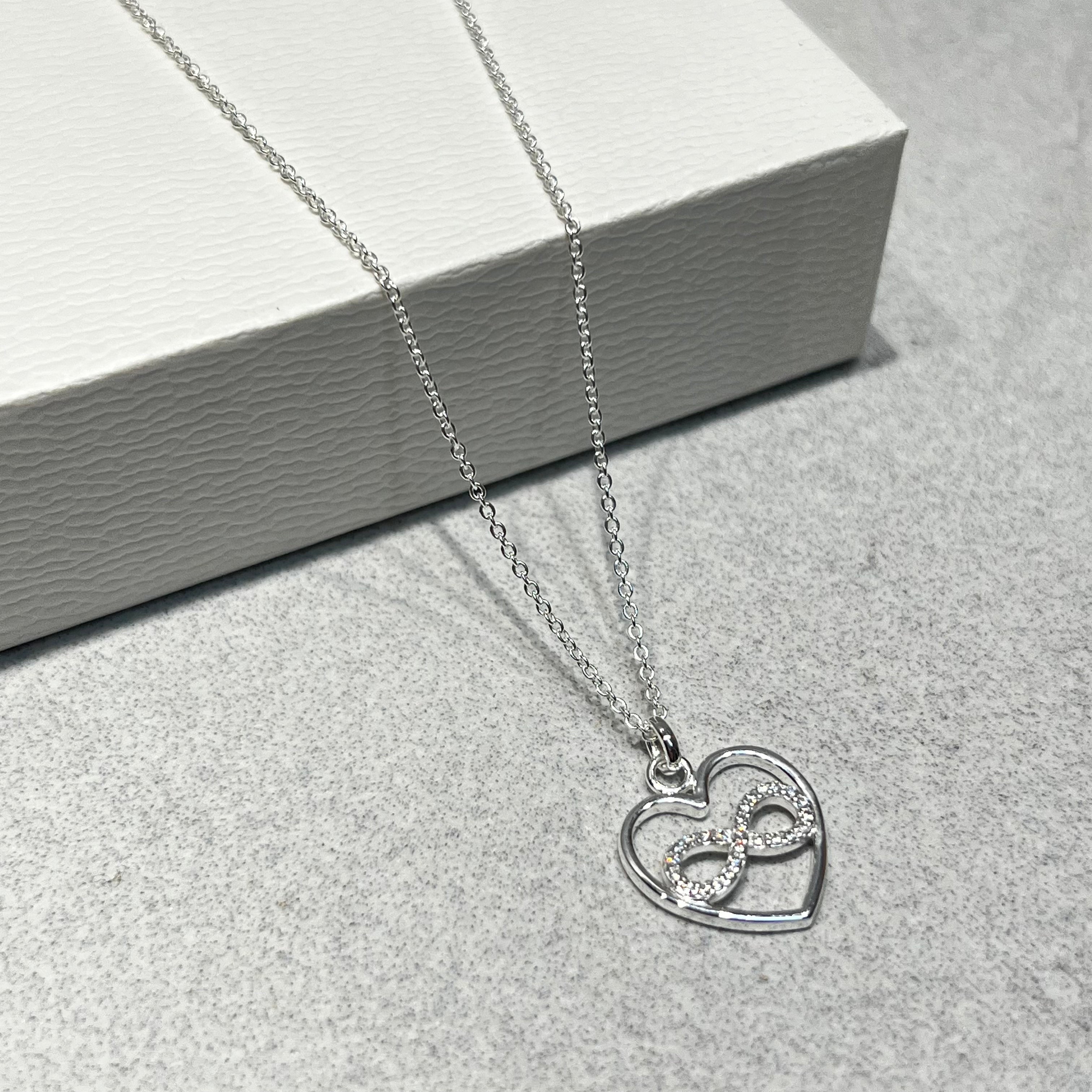 Unique and Co Sterling Silver and CZ Infinity Symbol within a Heart Necklace