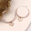 POM Pastel Pink Beaded Hoop Earrings with Shell Charm