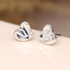 POM Silver plated wavy surface heart stud earrings