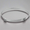 Adjustable heart crossover Sterling Silver Bangle