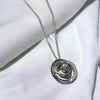 Unique & Co Silver and Rose Gold Zirconia Circular Swirl Necklace