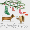 To A Lovely Niece - Hedgehog Holding Christmas Pudding/Stockings/Sausage Dog Card