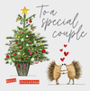 To A Special Coulple Merry Christmas - Hedgehogs Holding Hands/Hearts Card