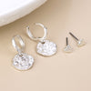 POM Solstice Silver textured disc drop hoop and heart stud earring set