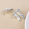 POM Colette Silver-Plated polished bow statement earrings
