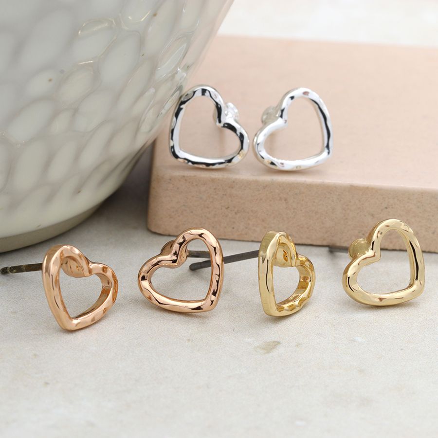 POM Three Pairs Of Cut Out Heart Earrings In Three Plating Colours