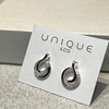 Unique & Co Sterling Silver and Rose Gold Zirconia Circular Twist Earrings