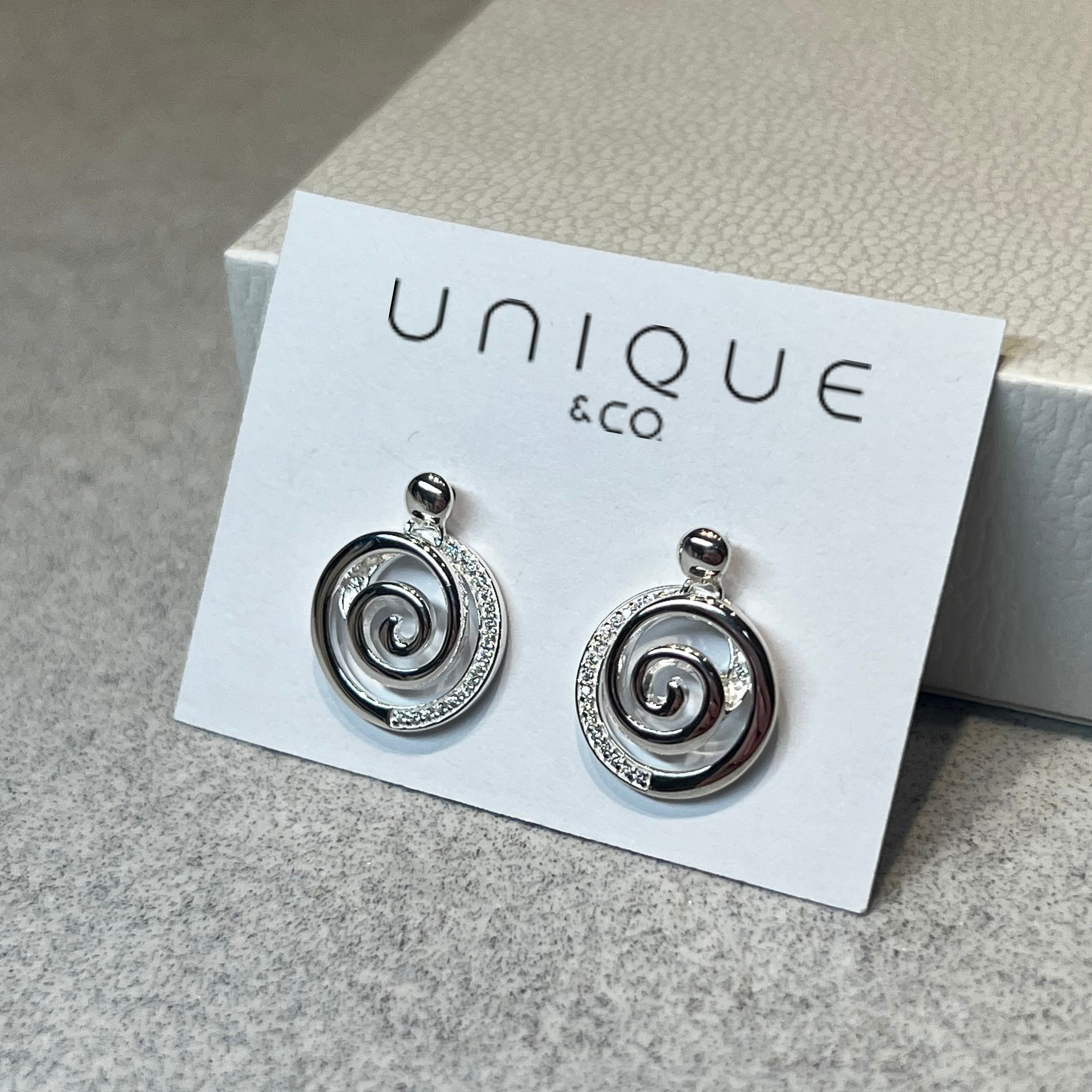 Unique & Co Silver Zirconia Circular Swirl Earrings