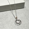 Unique & Co Sterling Silver and Rose Gold Zirconia Circular Twist Necklace