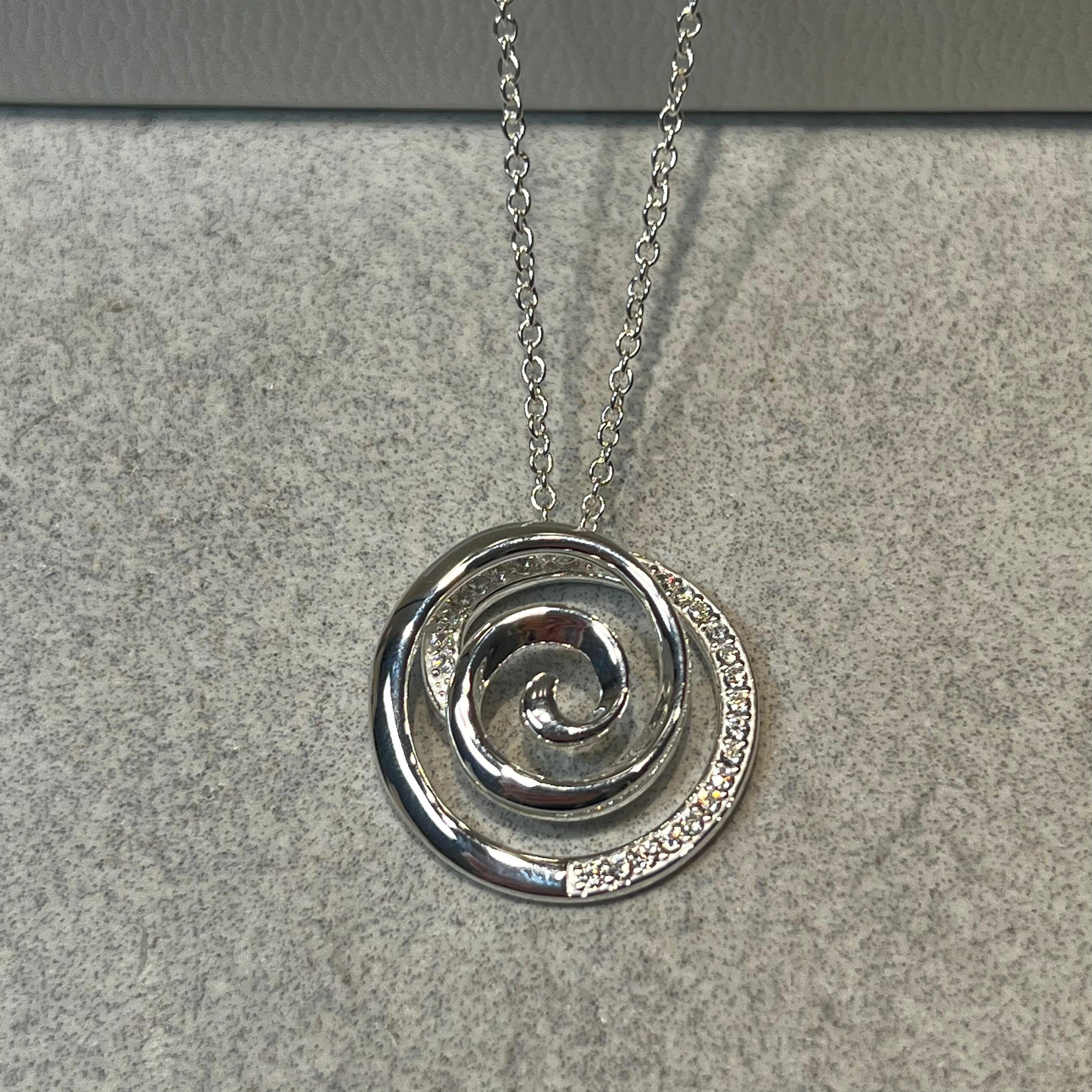 Unique & Co Silver Zirconia Circular Swirl Necklace