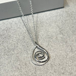 Unique & Co Silver Zirconia Swirl Necklace