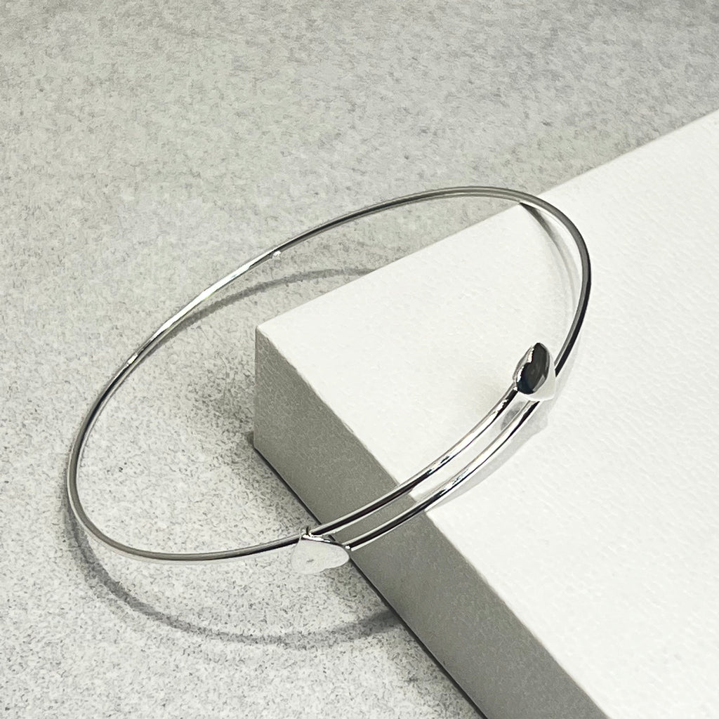 Adjustable heart crossover Sterling Silver Bangle