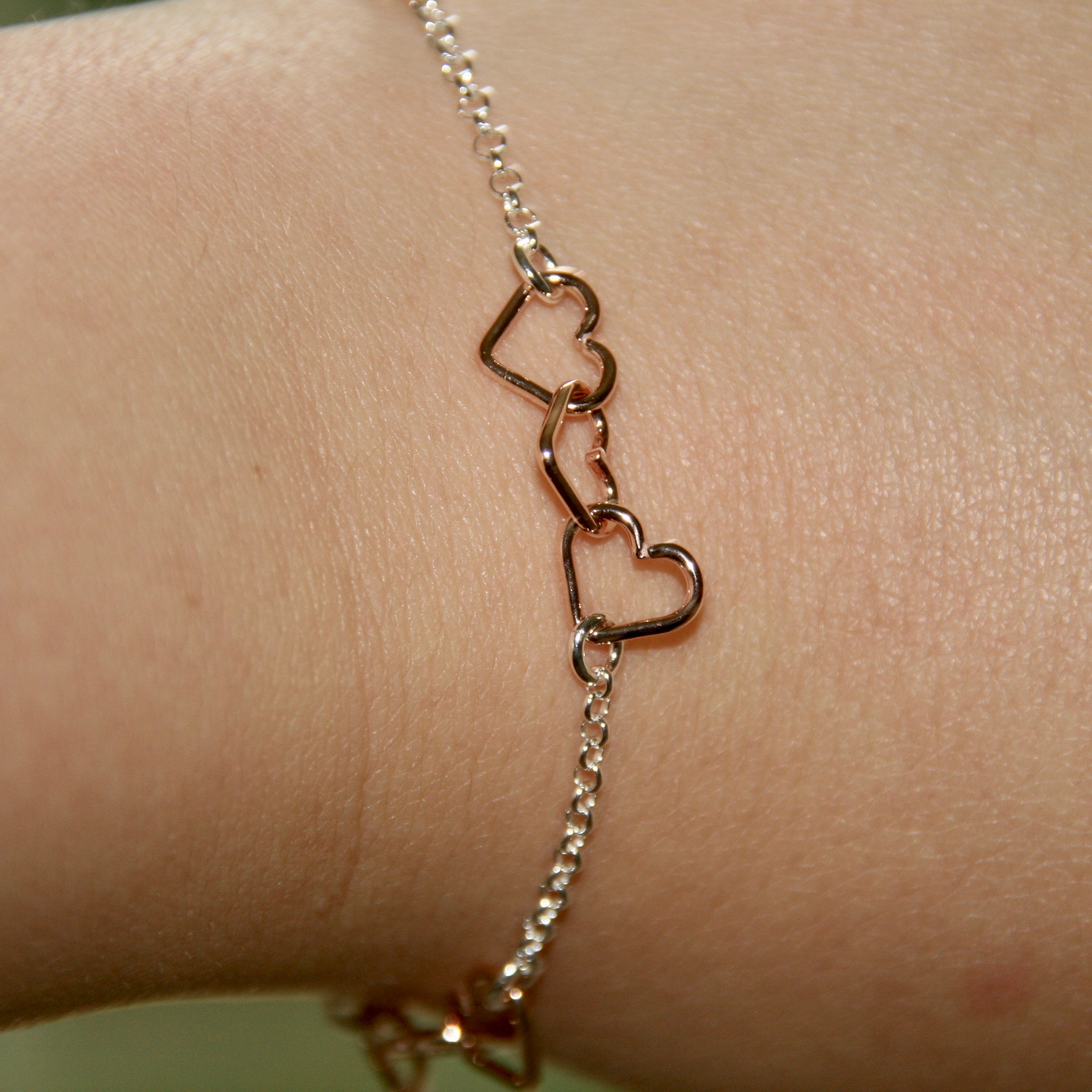 Sterling Silver & Rose Gold Linked Hearts Bracelet