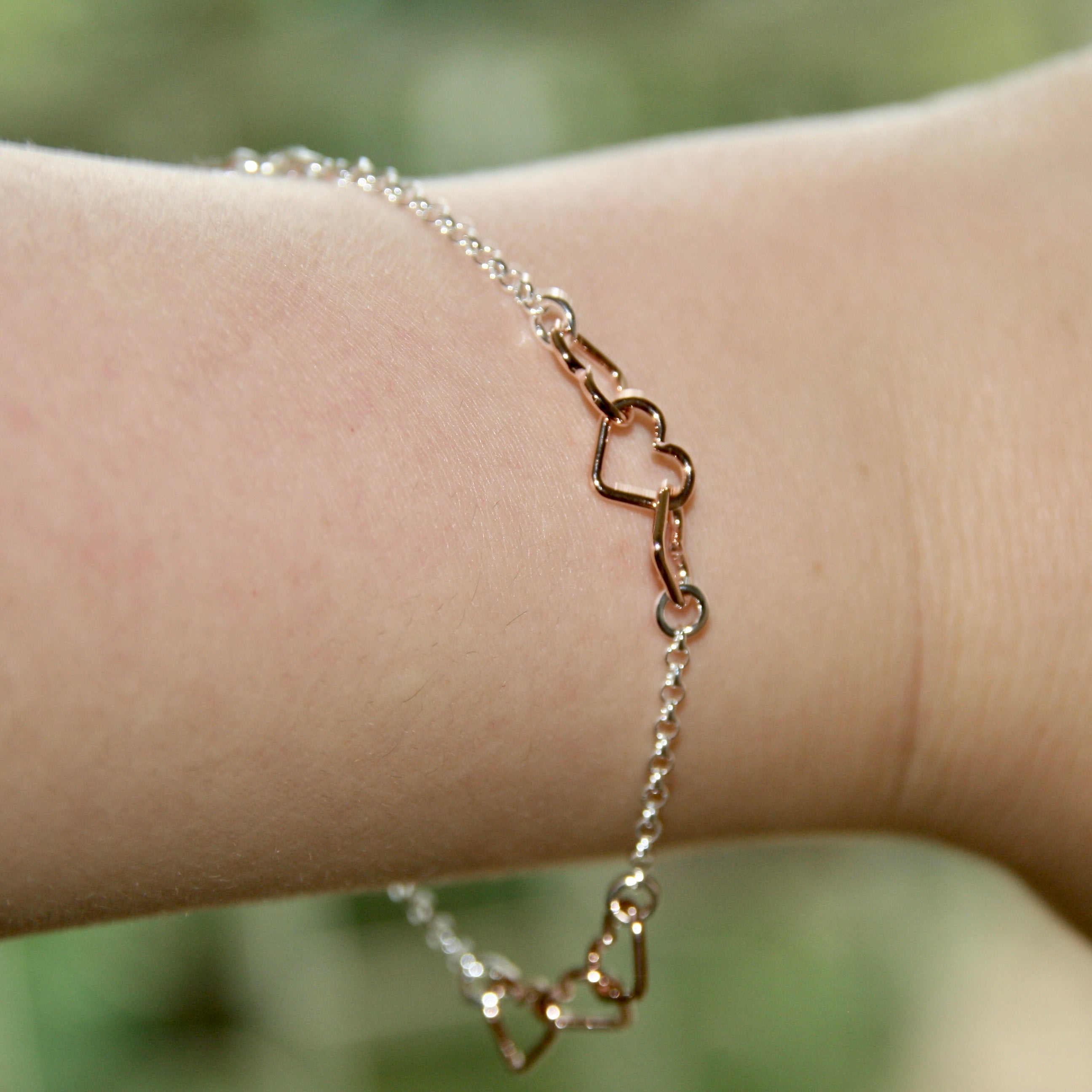 Sterling Silver & Rose Gold Linked Hearts Bracelet