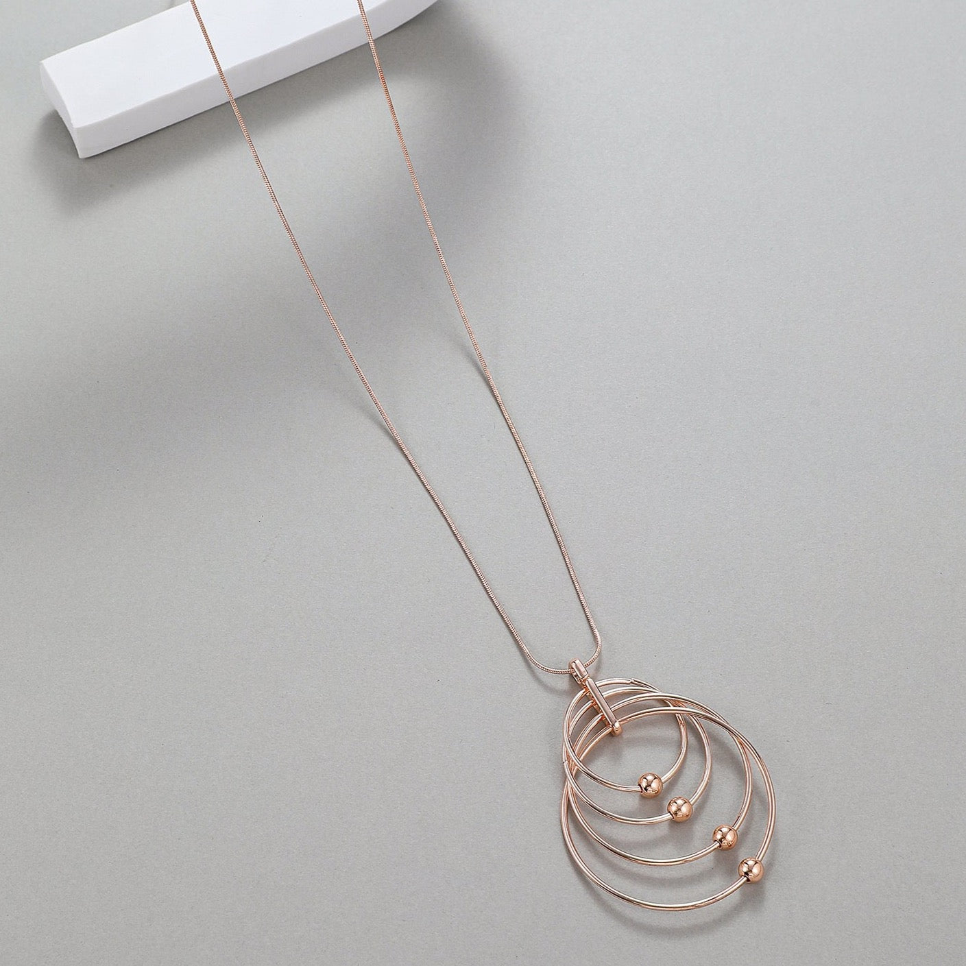 Rose Gold Circle and Ball Drop Necklace